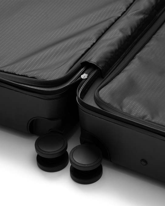 Cestovný kufor Db Ramverk Check-in Luggage Medium Black Out - 2025/26