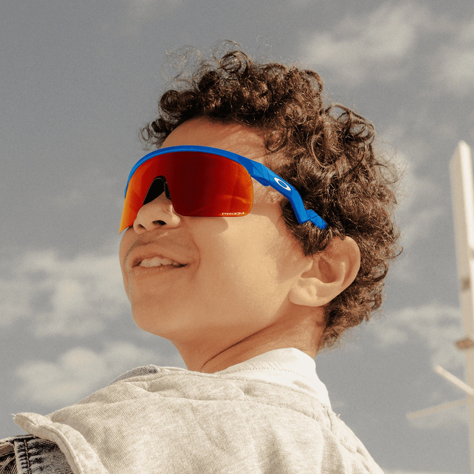 Slnečné okuliare Oakley Resistor Sky Blue Frame/Prizm Ruby Lenses